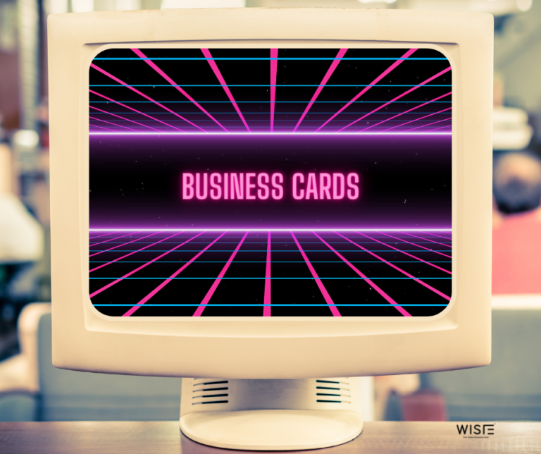 Old CRT screen with neon letters saying "Business Cards" in old neon font.