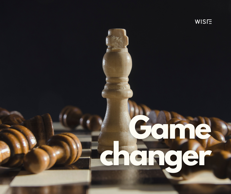 A piece of chess in the centre. The pieces belonging to the opponent are fallen down around it. On the image it is written: game changer. It is implied that digital business cards will substitute traditional paper ones by changing the game.